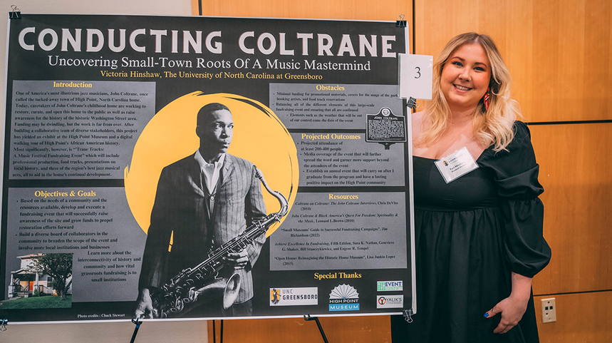 Victoria Hinshaw with her poster about John Coltrane